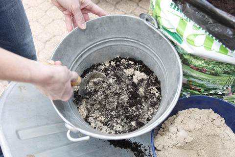 Mixing soil and sand